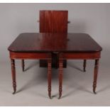 A Georgian mahogany D end dining table raised on turned supports. Length extended 181cm, Width