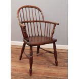 A 19th century ash/elm Windsor arm chair.