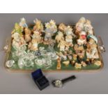 A tray of assorted collectables. Includes Cherished Teddies, Atlas Editions watch and cufflinks,