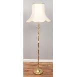A brass standard lamp.