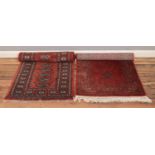 Two red ground wool runners. Includes Royal Keshan Afghan example (137cm x 68.5cm) and another (