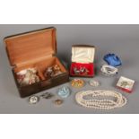 A box of costume jewellery. Including silver filigree butterfly brooch, paste set brooches, cuff