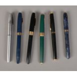 A quantity of fountain pens including Conway Stewart 36 with 14ct nib, Sheaffer and Parker.