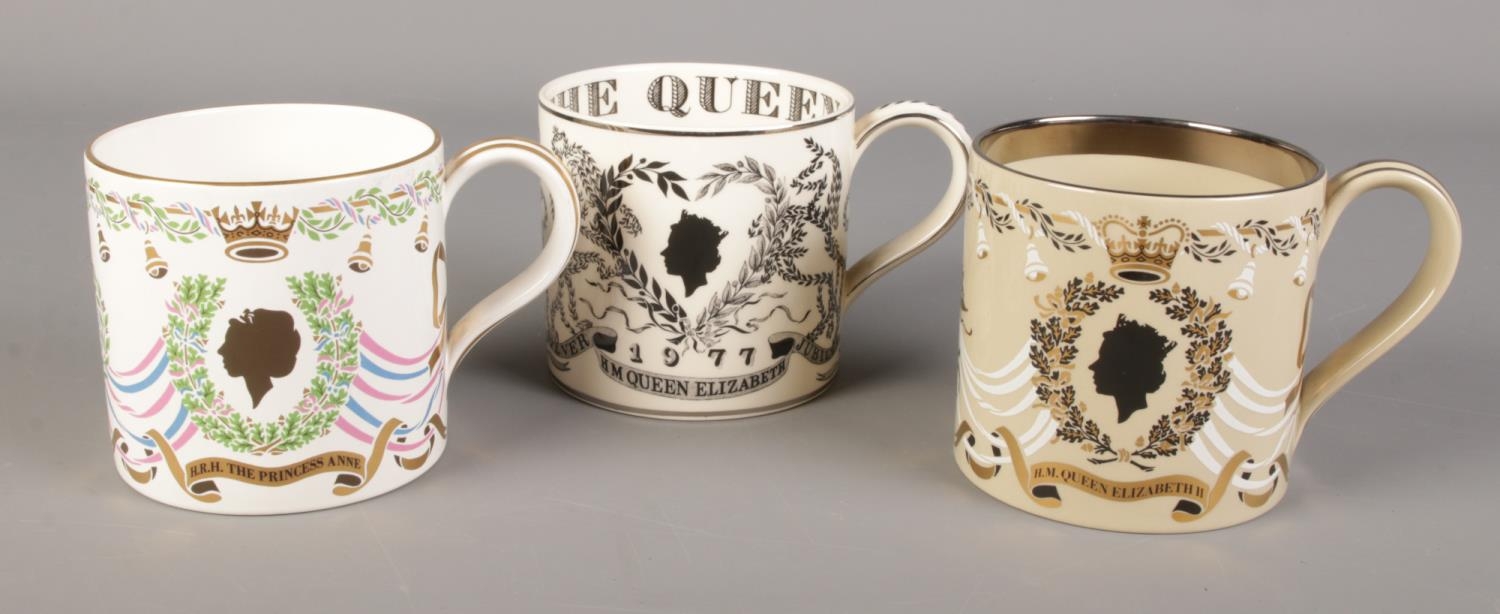 Three Wedgwood commemorative mugs designed by Richard Guyatt. Commemorating the silver jubilee and