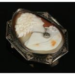 An egg-shaped cameo brooch portrait of a lady, wearing diamond pendant necklace, with 14ct Gold