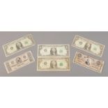 USA Banknotes; To include 'The Confederate Fifty Dollars', dated February 17th 1864, and four