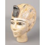 A small plaster bust of King Tutankhamun. 19cm.