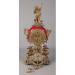 An antique mantel clock surmounted with spelter cherubs. The movement stamped Lenzkirch 1 million.