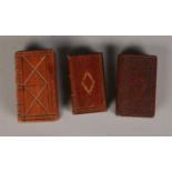 A pair of mahogany snuff boxes including parquetry decorated example. Also includes paper weight