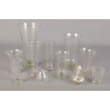 A collection of vintage and antique scientific/chemical glass measures etc.