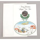 A Pobjoy Mint Isle of Man Christmas 1985 50p piece, with envelope.