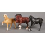 Three Beswick horses. Includes shire horse, palomino and Black Beauty.