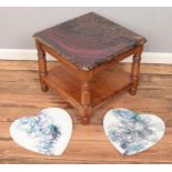A pine coffee table with painted and varnished top along with two heart shaped oil on canvas.