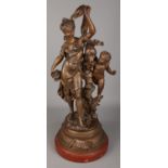 Par Bruchon, A French spelter figure group of a maiden and cherub. Titled 'La Source'. (60cm)