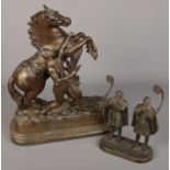 A spelter Marley horse figure group along with a bronzed figure group marked Edw AAgaard,