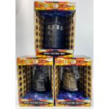 DOCTOR WHO die-cast collectible daleks in black and gold and a collectible TARDIS (some damage to