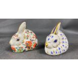 ROYAL CROWN DERBY - two gold button rabbits both approx 8cm long, one labelled MEADOW RABBIT -