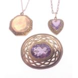 An octagonal shaped 9ct back and front stamped locket on a yellow metal 38cm chain, locket - 2cm,