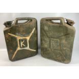 A pair of military jerry cans both carrying broad arrow military issued stamps