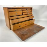 An Old Engineering mahogany box, with pull-down front to reveal a set of 8 drawers - width 46cm,