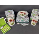 A selection of four boxed PORTMEIRION items consisting of a cafetiere, a jug, a cake stand with