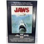 A framed iconic JAWS advertising poster frame size 92x60cm