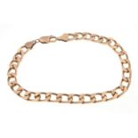 A 375 stamped 9ct yellow gold flat link chain bracelet with lobster claw fastening 20cm long,