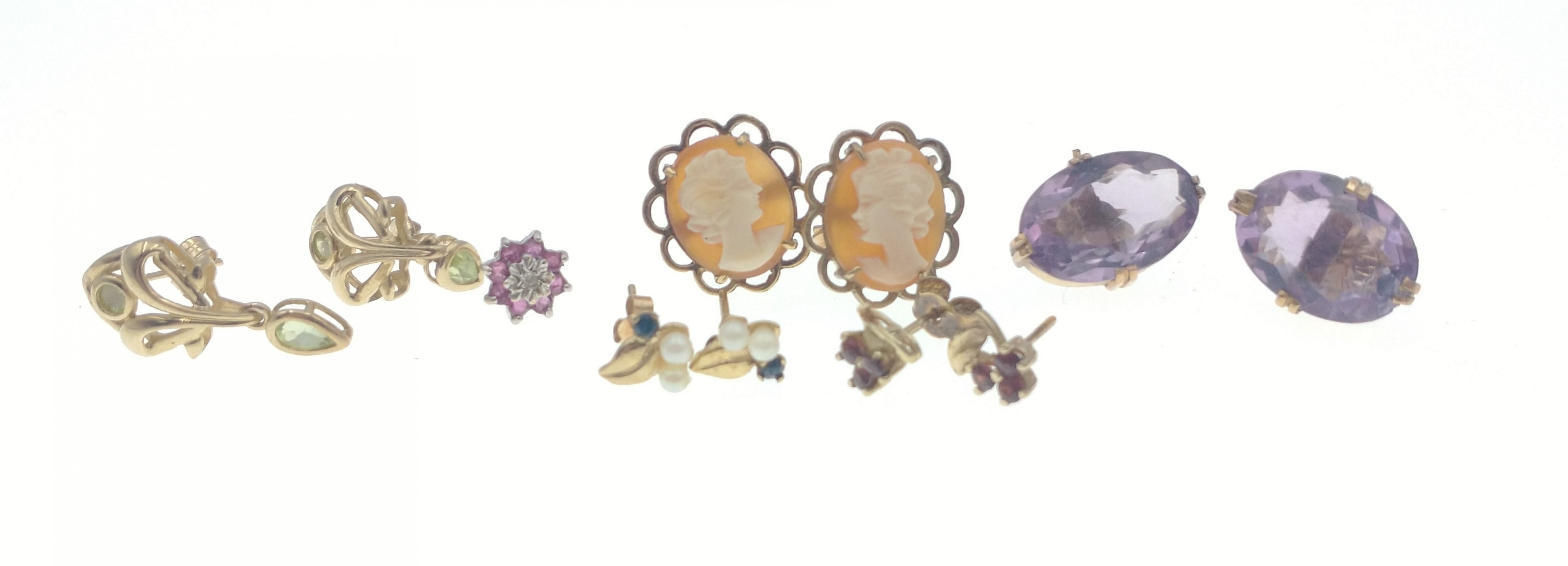 Five assorted pairs of earrings set with seed pearls, amethysts, cameos etc gross weight 10.45g