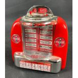 A working model COCA COLA JUKE BOX from 1996 (JB 15715), plays a selection of vintage Coke