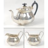 A James Deacon and Son SHEFFIELD silver tea service Hallmarked 1928 comprising a teapot 523g gross