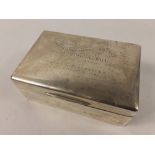 A silver box, hallmarked London 1946, with the following inscribed on the lid: 'Presented To Mr, J