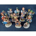 A selection of ten GOEBEL character figurines to include Apple tree boy, (742/1), two apple tree