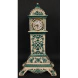 A DELFT green hand-painted clock standing 35cm high