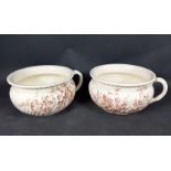 A pair of chamberpots, in Oriental Ivory by Rose Groups 23cm dia