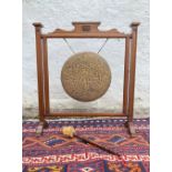 IMPRESSIVE ! A VICTORIAN large brass and hand carved dinner gong with original striker(striker