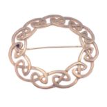 A 375 stamped 9ct yellow gold circular twisted knot open design brooch, 4 cm diameter, weight 9.09g