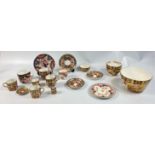 A collection of IMARI ware to include some ROYAL CROWN DERBY cups and saucers, a POINTONS bowl