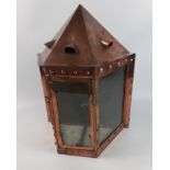 An attractive copper lantern with 3 glass panels which can be either free-standing or