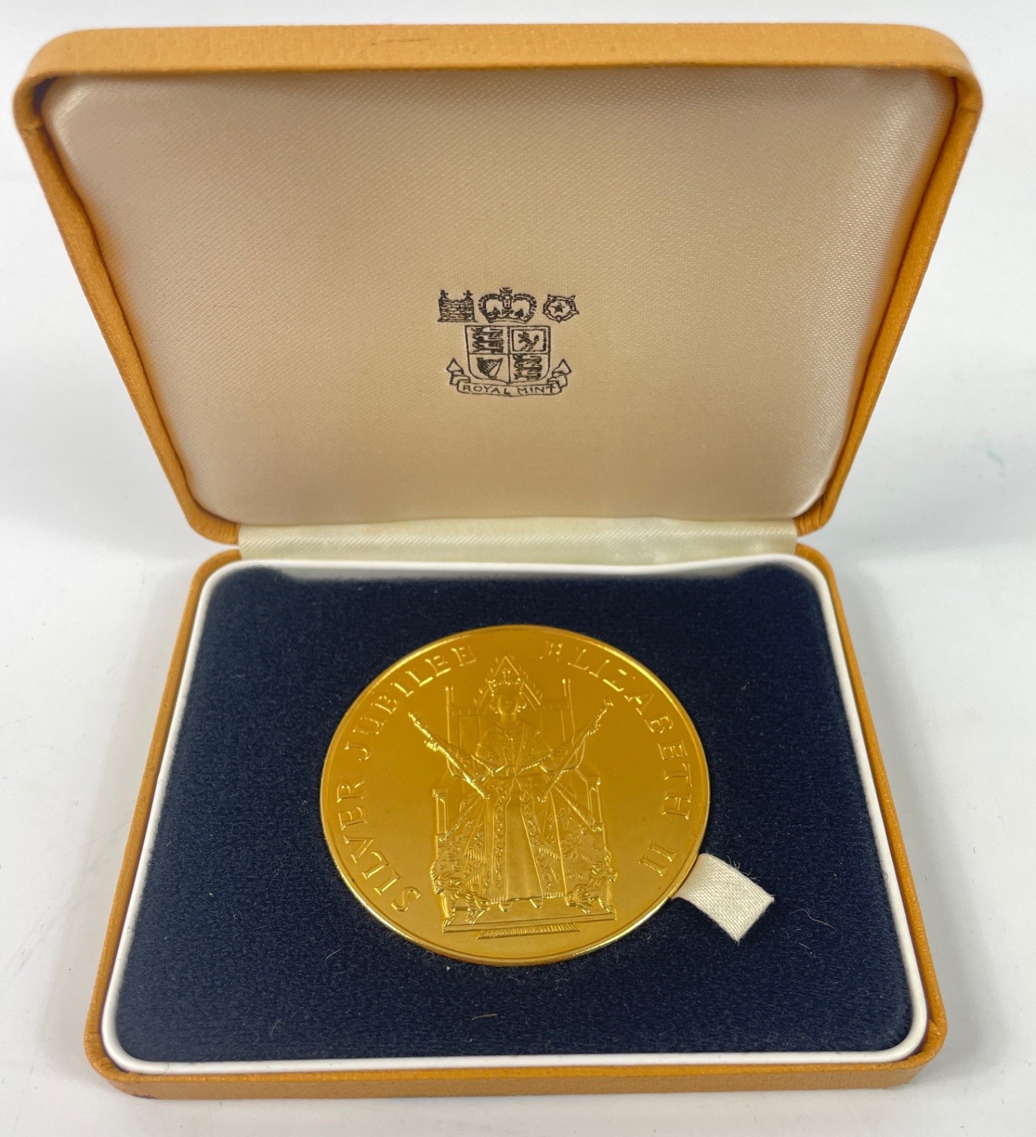 A Silver Jubilee Queen Elizabeth 1952- 1977 Commemorative gold plated coin within its original