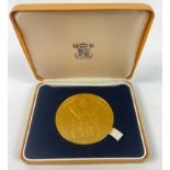 A Silver Jubilee Queen Elizabeth 1952- 1977 Commemorative gold plated coin within its original