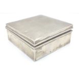 A wooden-lined monogrammed silver hallmarked (Birmingham 1931) box possibly by Walker & Hall