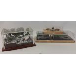 A collection of JAMES BOND Perspex boxed scenes from movies to include the DB5 etc - 4 models in