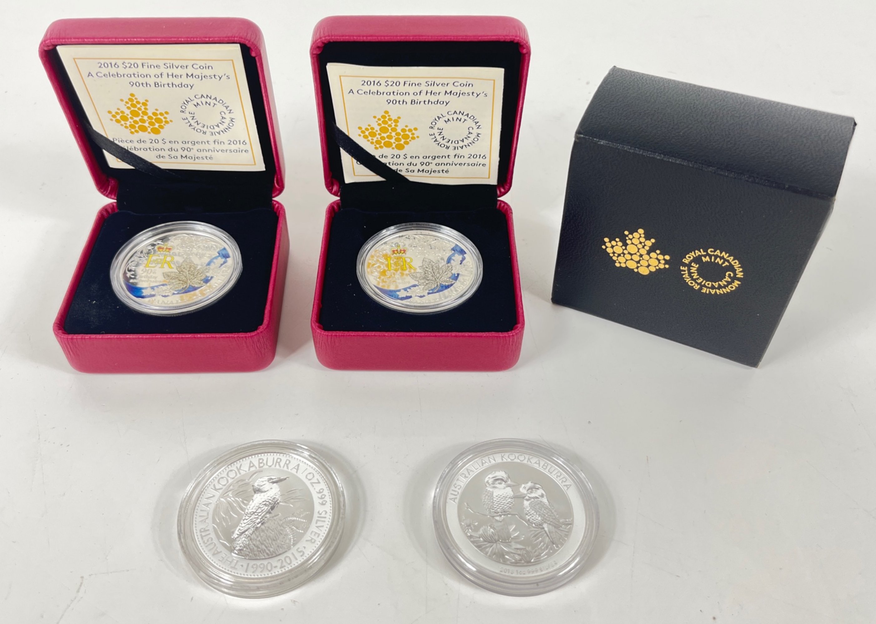 A 2016 $20 Canadian Elizabeth II 90th birthday and an Australian kookaburra silver 2013 set of