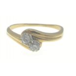 DIAMONDS ARE A GIRLS BEST FRIEND! - A lovely 750 stamped yellow gold dress ring with two shining