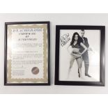 A 'SIGNED BOND GIRL' picture Martine Beswick with Sean Connery complete with its glass framed DK