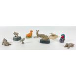 A collection of small animals, mainly white metal to include a deer, 2 puppies, a swan etc plus a