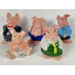 A collection of 5 NAT WEST piggy banks all stamped WADE to the base and all with original stoppers