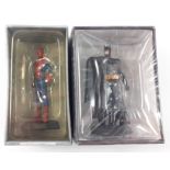 Two shrink-wrapped collectible models by EAGLEMOSS being Batman and Spiderman