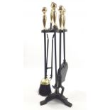 Substantial companion set in brass and cast iron