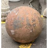 A SUBSTANTIAL AND EXTREMELY HEAVY red sandstone ORB for the garden - diameter 30cm diameter approx